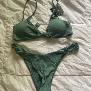 Dark mint green bikini, never worn with tag